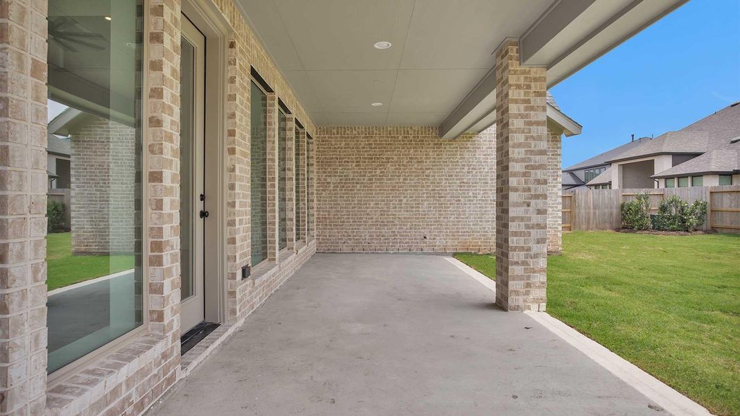 Exterior details and patio area of a home in Grange, Katy (Image 2). Exterior details and patio area of a home in Grange, Katy (Image 2).