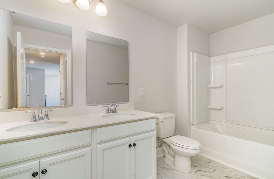 Representative furnished interior of a home built from the BELFORT by D.R. Horton in Brunswick Plantation, Calabash (Image 11).