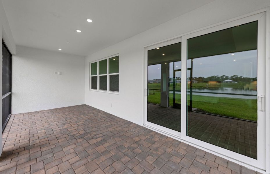 Exterior details and patio area of a home in Shores at Stillwater, Englewood (Image 26). Exterior details and patio area of a home in Shores at Stillwater, Englewood (Image 26).