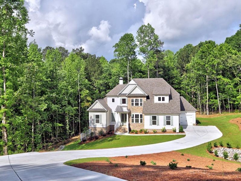 Front exterior of a new home in , Cumming, GA, highlighting curb appeal (Image 29). Front exterior of a new home in , Cumming, GA, highlighting curb appeal (Image 29).