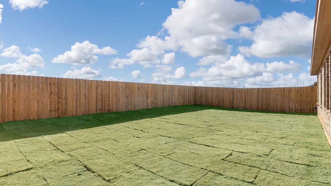 Exterior details and patio area of a home in Overlook West, Wolfforth (Image 3).