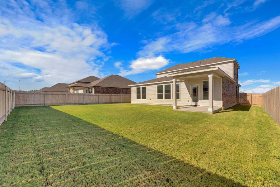 Exterior details and patio area of a home in Mustang Valley, Manor (Image 16). Exterior details and patio area of a home in Mustang Valley, Manor (Image 16).