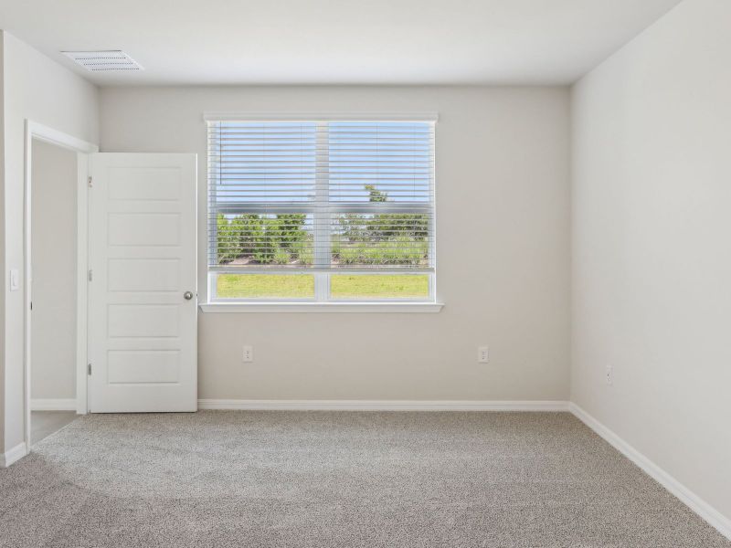 Primary suite in the Ibis floorplan at 44518 Cable Creek Dr