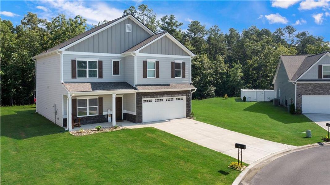 Front exterior of a new home in , Rome, GA, highlighting curb appeal (Image 17).