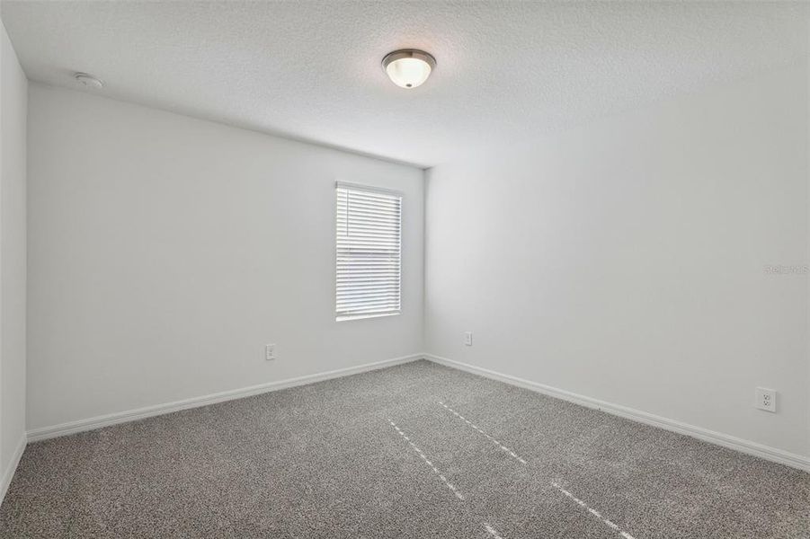Spacious, unfurnished interior of a new home in The Meadow at Crossprairie, St. Cloud (Image 24).