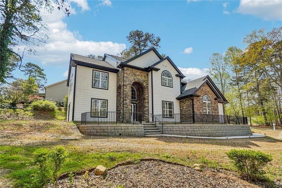 Front exterior of a new home in , Grayson, GA, highlighting curb appeal (Image 26).