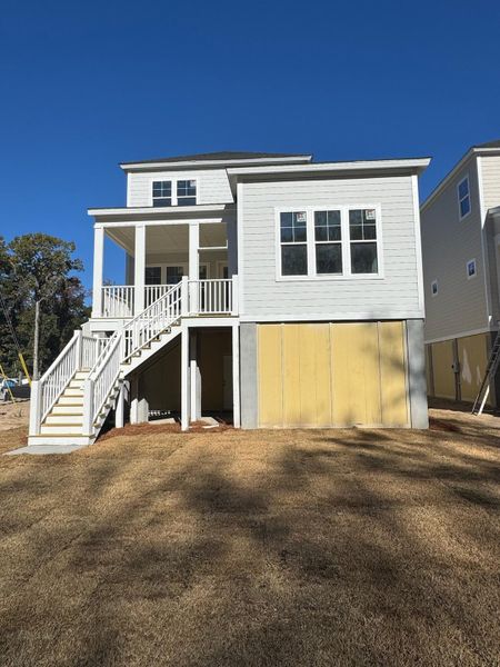 Exterior details and patio area of a home in Indigo Grove Single Family Homes, Johns Island (Image 25).