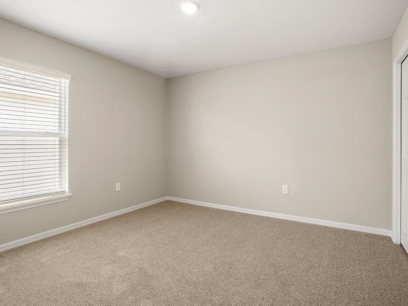 Large secondary bedrooms provide space for everyone in your household - Sophia by Highland Homes