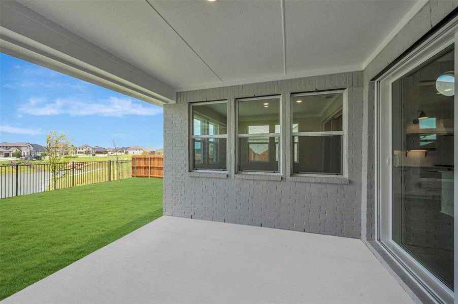 Exterior details and patio area of a home in Elevon, Lavon (Image 3).