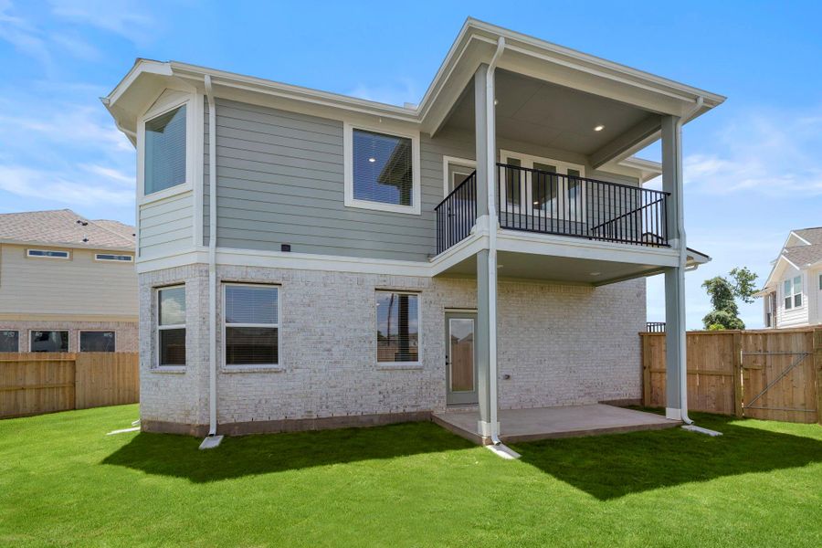 Front exterior of a new home in Sienna, Missouri City, TX, highlighting curb appeal (Image 12). Front exterior of a new home in Sienna, Missouri City, TX, highlighting curb appeal (Image 12).
