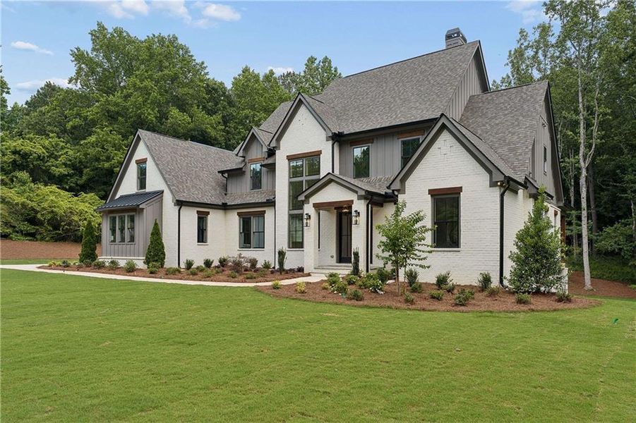 Front exterior of a new home in , Canton, GA, highlighting curb appeal (Image 1). Front exterior of a new home in , Canton, GA, highlighting curb appeal (Image 1).