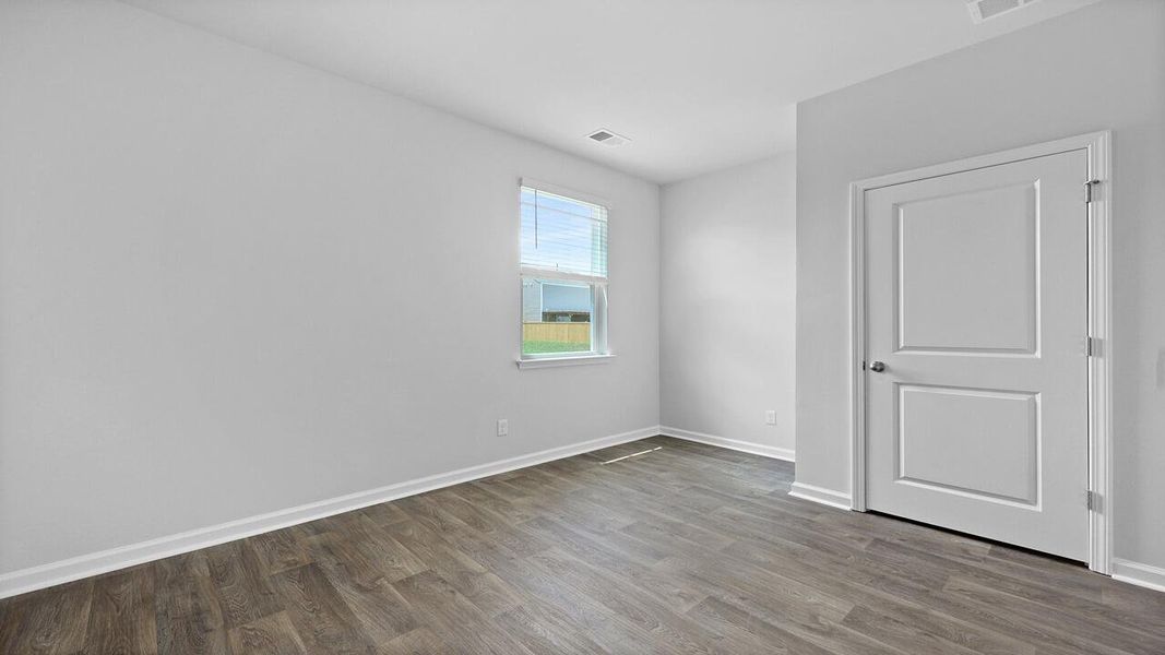 Spacious, unfurnished interior of a new home in Pine Hills at Cane Bay, Summerville (Image 15).