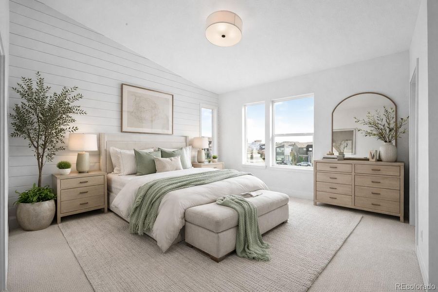 Primary suite featuring large walk-in closet and ensuite bathroom. Virtually Staged.