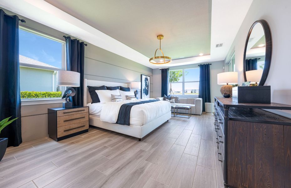 Representative furnished interior of a home built from the Easley by DiVosta in Emerson Oaks, Vero Beach (Image 28).