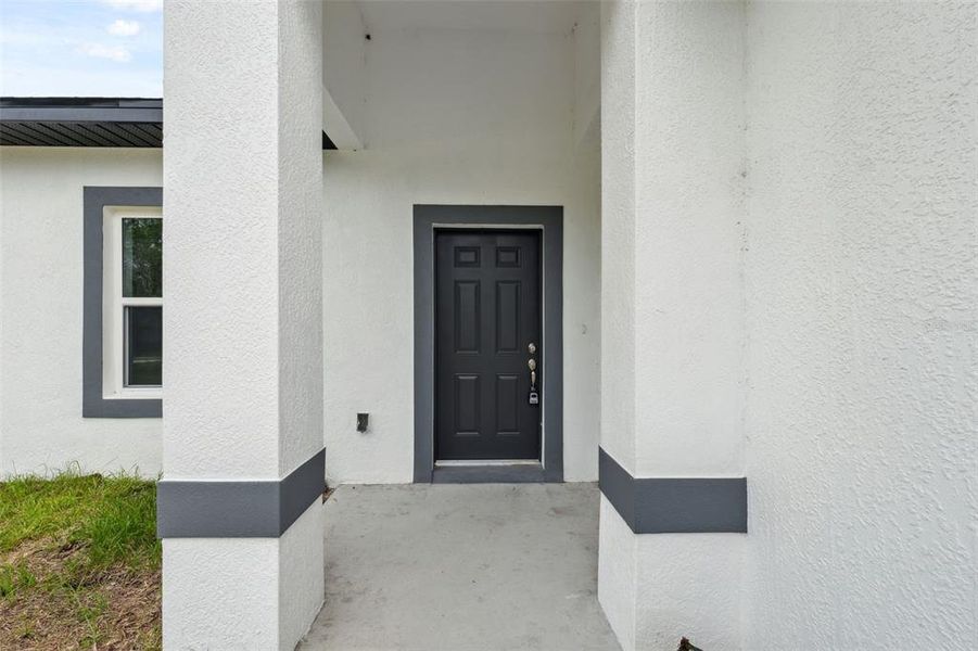 Front exterior of a new home in , Ocala, FL, highlighting curb appeal (Image 1).