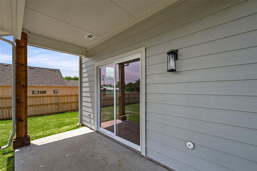 Exterior details and patio area of a home in , Granbury (Image 23).