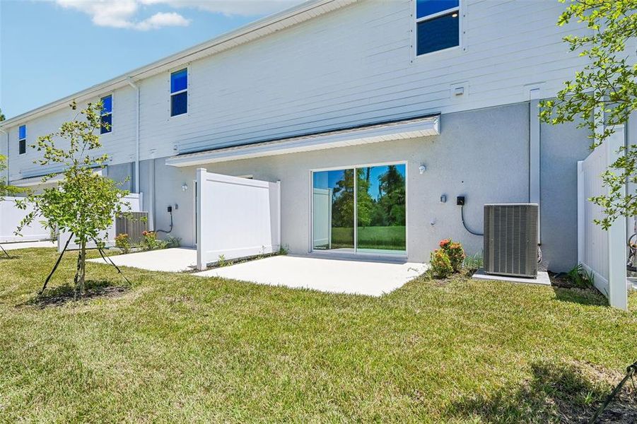 Exterior details and patio area of a home in The Towns at Tiburon, Nokomis (Image 3).