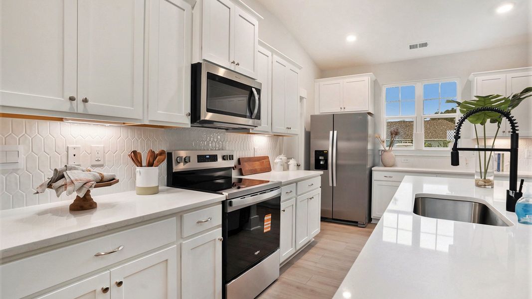 Furnished interior view inside a new home in The Preserve at Shaftesbury Glen, Conway (Image 8).