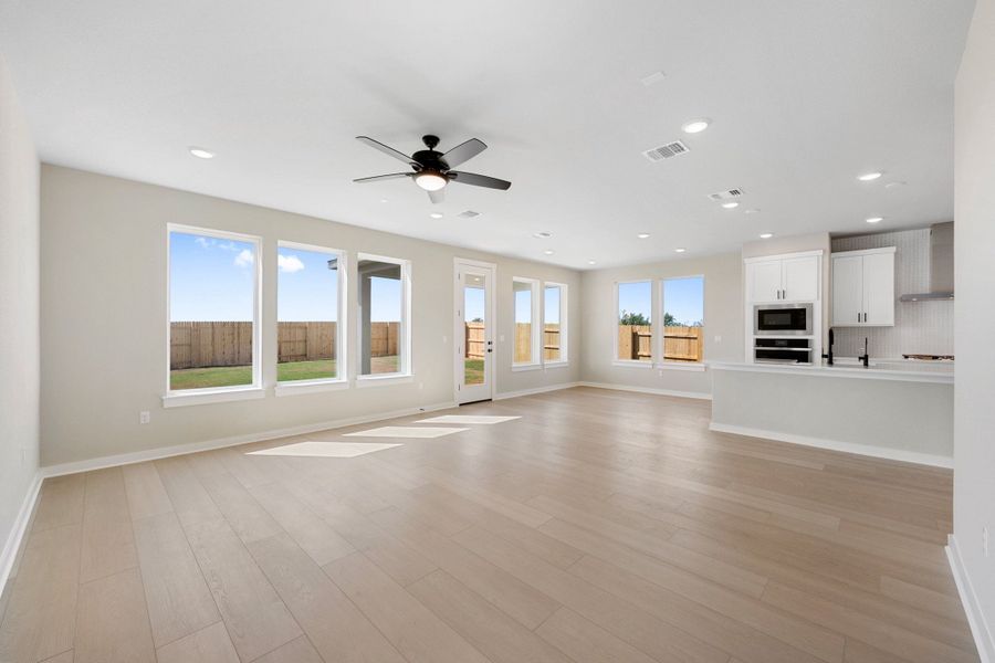Spacious, unfurnished interior of a new home in Terrace Collection At Turner's Crossing, Buda (Image 33).