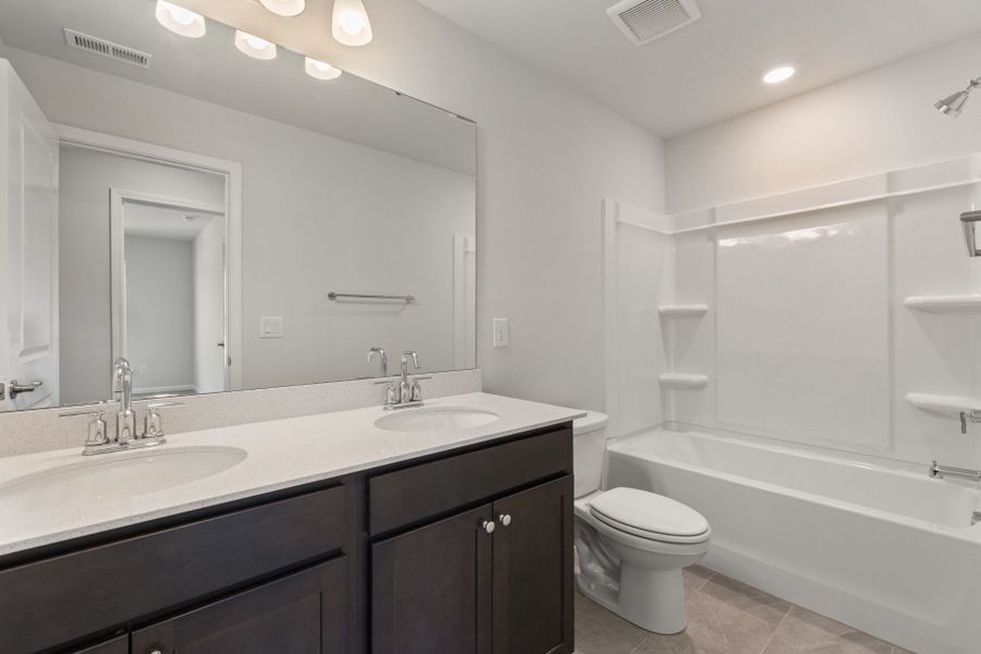 Furnished interior view inside a new home in Poets Walk, Whitsett (Image 7).