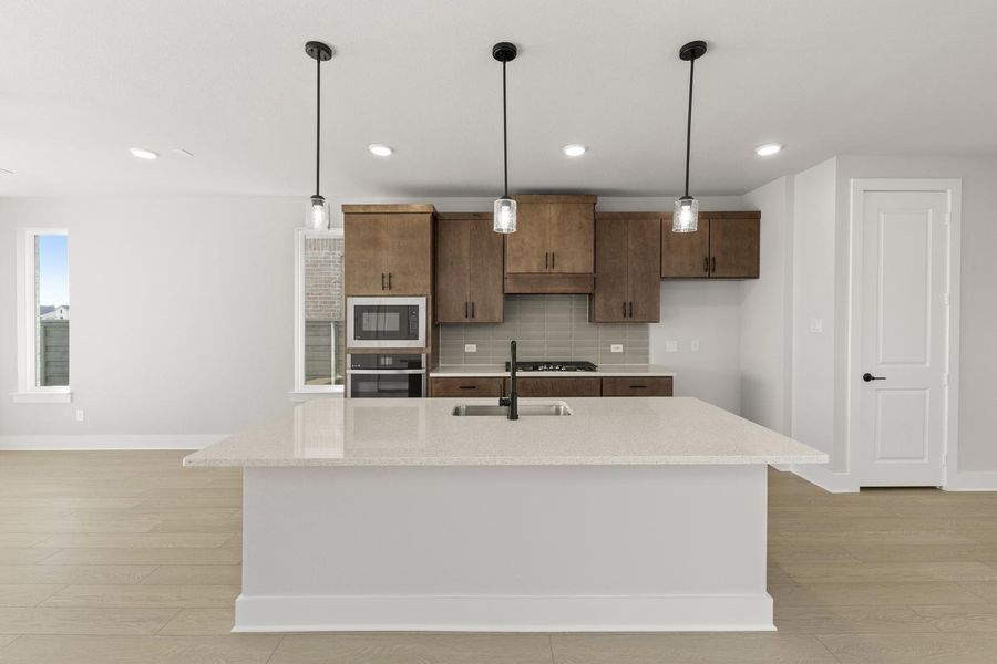 Furnished interior view inside a new home in Garden Collection at Union Park, Little Elm (Image 5). Furnished interior view inside a new home in Garden Collection at Union Park, Little Elm (Image 5).