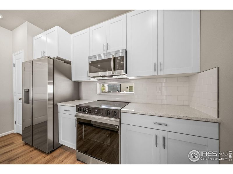 Furnished interior view inside a new home in Thompson River Ranch, Johnstown (Image 6).