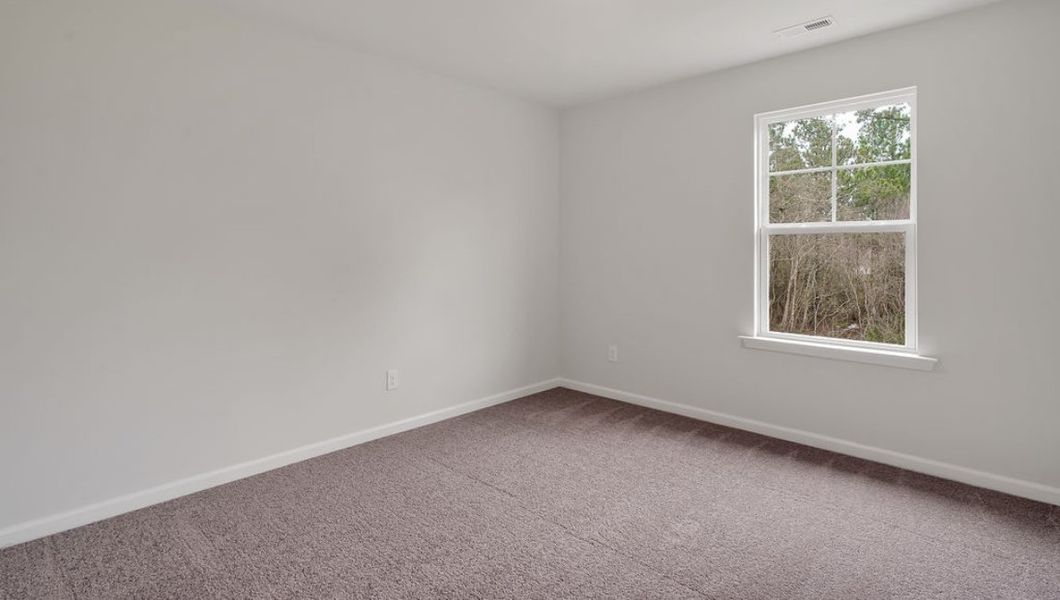 Representative unfurnished interior of a home built from the GLYNN by D.R. Horton in Grayson Park, Leland (Image 30).