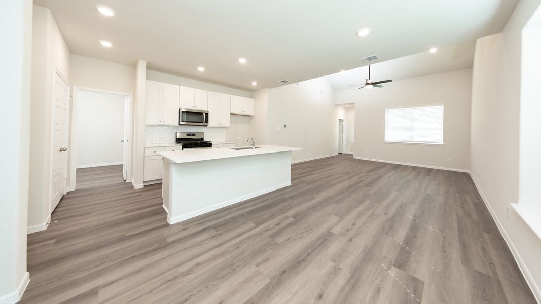 Dining Area to Kitchen and Family Room
