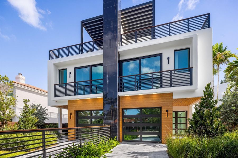 Front exterior of a new home in , Fort Lauderdale, FL, highlighting curb appeal (Image 20). Front exterior of a new home in , Fort Lauderdale, FL, highlighting curb appeal (Image 20).