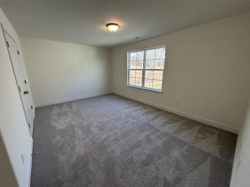 Spacious, unfurnished interior of a new home in Miller's Reserve, Winston-Salem (Image 46).
