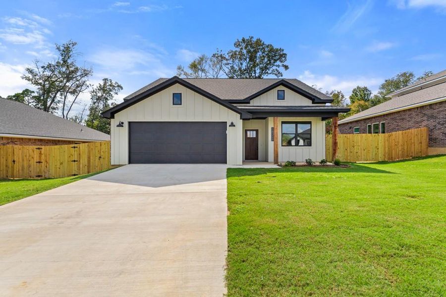 Front exterior of a new home in , Lindale, TX, highlighting curb appeal (Image 22). Front exterior of a new home in , Lindale, TX, highlighting curb appeal (Image 22).