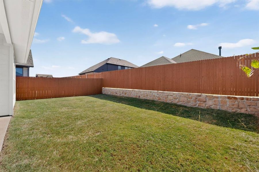Exterior details and patio area of a home in Heartland, Heartland (Image 21).