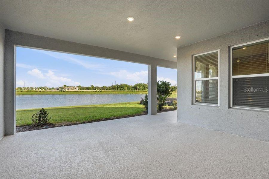 Exterior details and patio area of a home in Palms at Coasterra, Palmetto (Image 3).