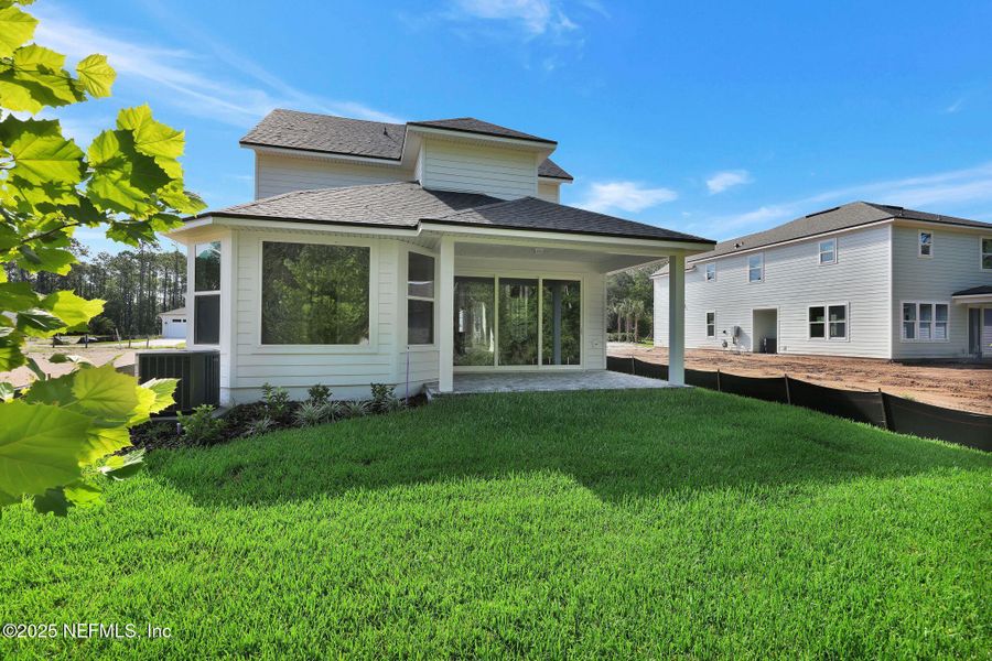 Front exterior of a new home in Reflections at Nocatee, Nocatee, FL, highlighting curb appeal (Image 2).