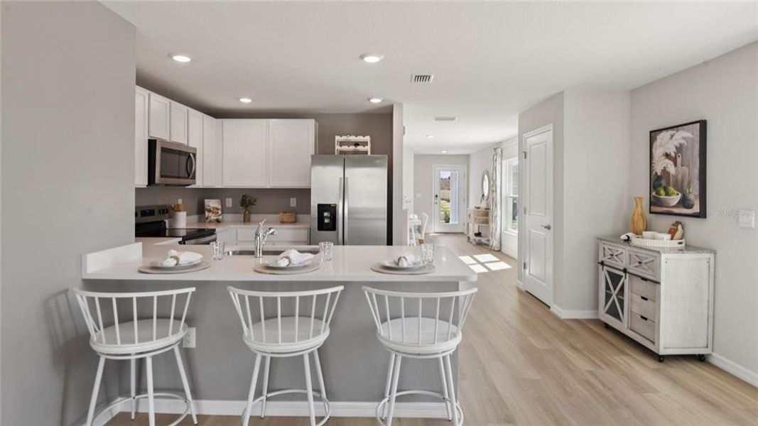 Furnished interior view inside a new home in Sandal Key, Weeki Wachee (Image 9).