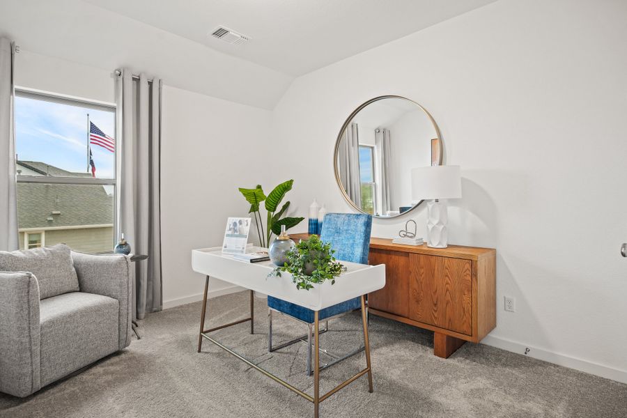 Bedroom/ Home Office in a Trinity Ranch Oak Model home in Elgin TX by Trophy Signature Homes