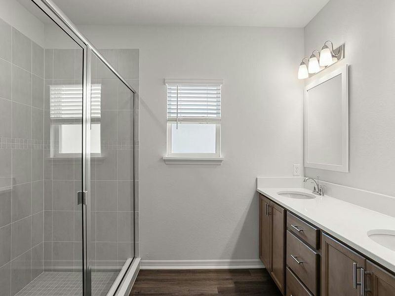 Your suite is complete with a walk-in wardrobe and private en-suite bath.