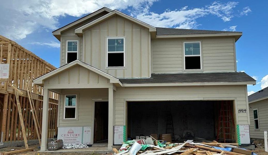 Front exterior of a new home in Northpark South, Porter, TX, highlighting curb appeal (Image 1).