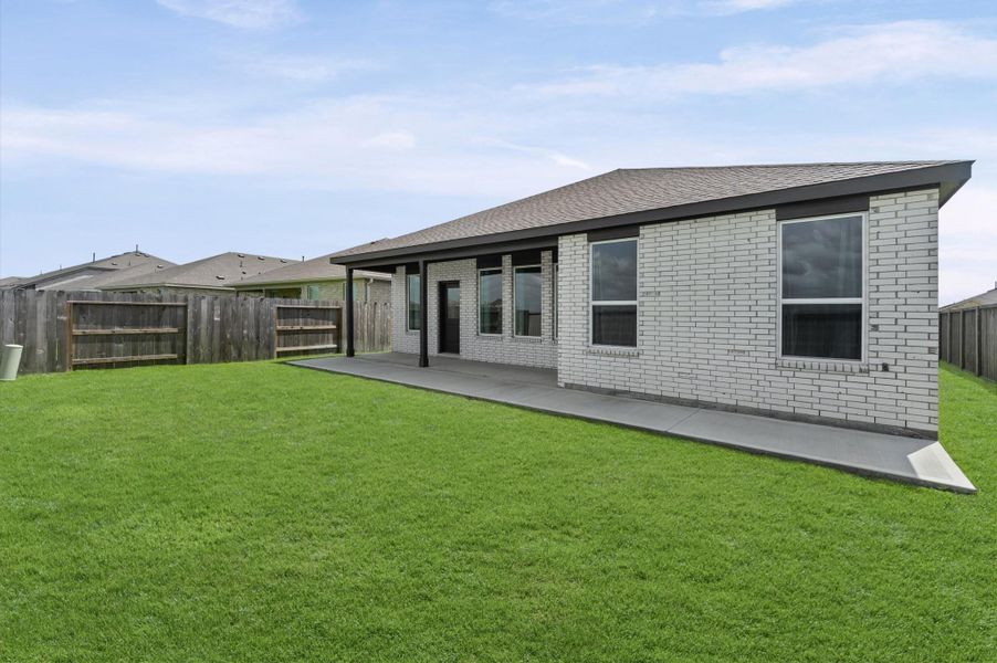 Exterior details and patio area of a home in The Grand Prairie, Hockley (Image 25).
