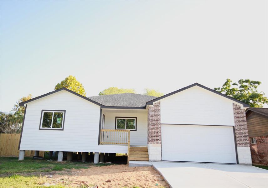Front exterior of a new home in , Houston, TX, highlighting curb appeal (Image 1). Front exterior of a new home in , Houston, TX, highlighting curb appeal (Image 1).