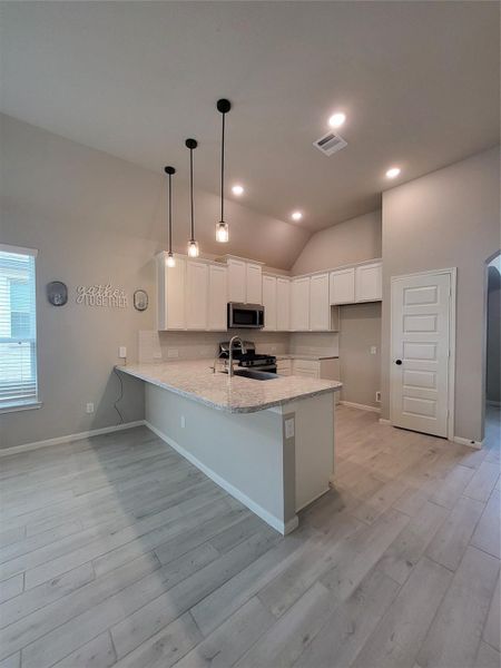 Furnished interior view inside a new home in Lexington Heights, Willis (Image 8).