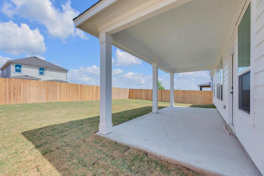 Front exterior of a new home in Salerno - Classic Collection, Round Rock, TX, highlighting curb appeal (Image 24). Front exterior of a new home in Salerno - Classic Collection, Round Rock, TX, highlighting curb appeal (Image 24).