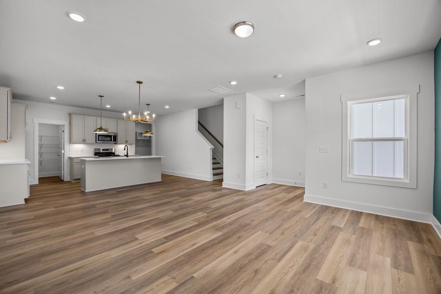 Representative unfurnished interior of a home built from the Someway Somehow by Garman Homes in Allen Park, Raleigh (Image 14). Representative unfurnished interior of a home built from the Someway Somehow by Garman Homes in Allen Park, Raleigh (Image 14).
