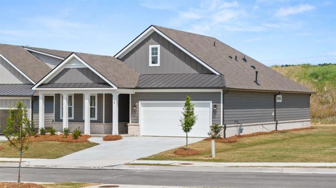Front exterior of a new home in Hamptons at Riverwood North, Dallas, GA, highlighting curb appeal (Image 1).