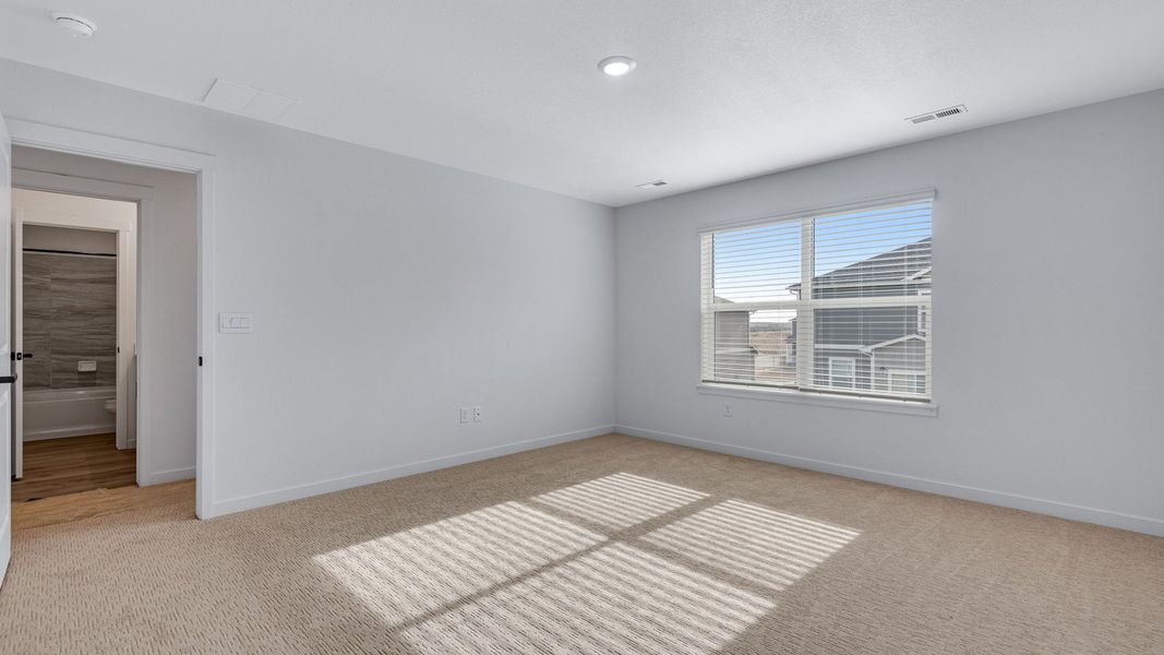 Spacious, unfurnished interior of a new home in Trails at Crowfoot, Parker (Image 21).
