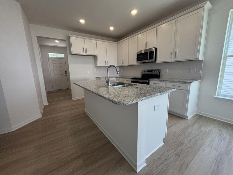 Furnished interior view inside a new home in CraigStone, Woodruff (Image 4).