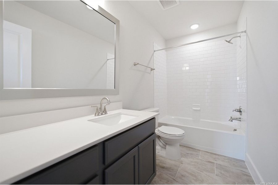 Furnished interior view inside a new home in The Woodlands at Medina Hills, Mico (Image 7).