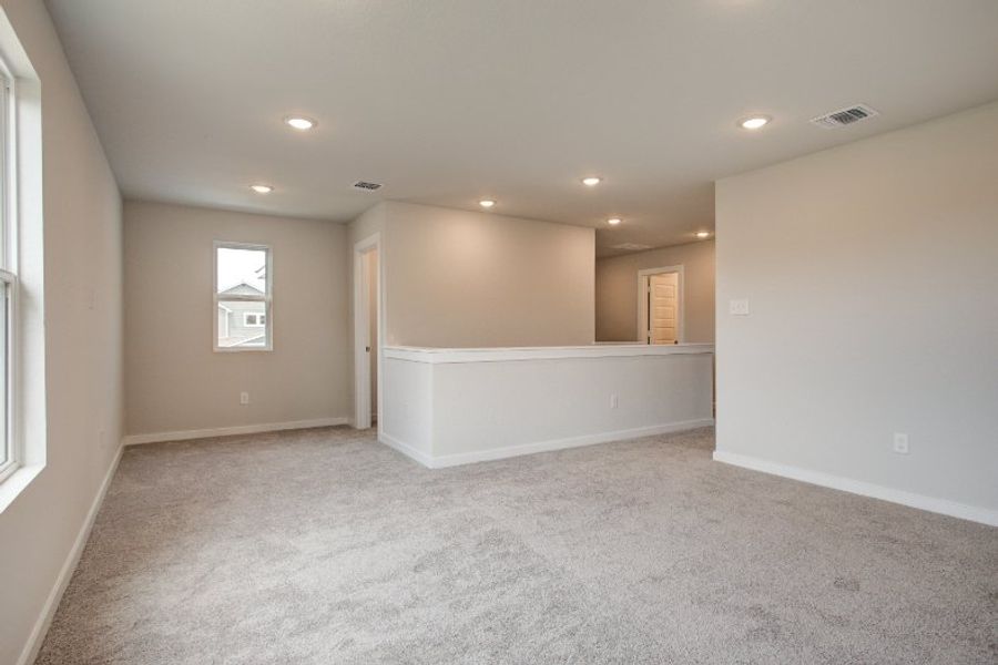 A room with a white wall and a white floor. A room with a white wall and a white floor.