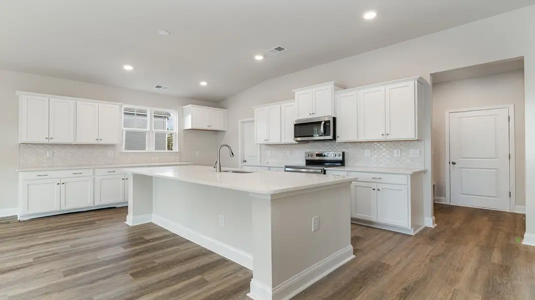 Furnished interior view inside a new home in Auberon Woods, Conway (Image 4).