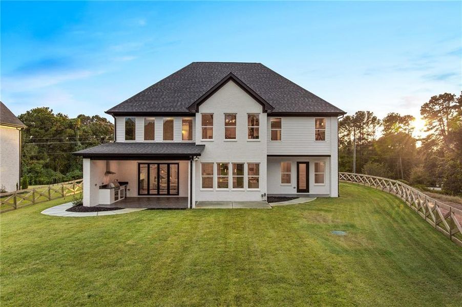 Front exterior of a new home in , Braselton, GA, highlighting curb appeal (Image 27). Front exterior of a new home in , Braselton, GA, highlighting curb appeal (Image 27).
